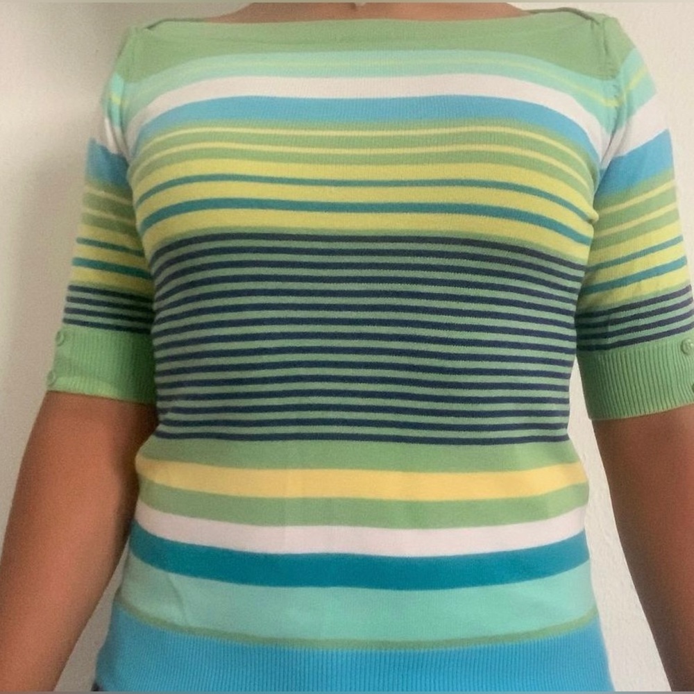 Multi color green shirt.